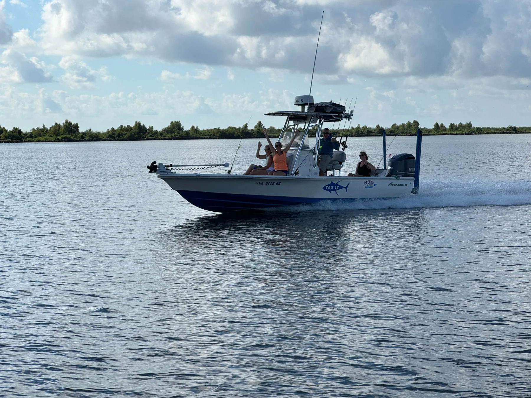 Tag It Charters boat with guests enjoying a day on the water